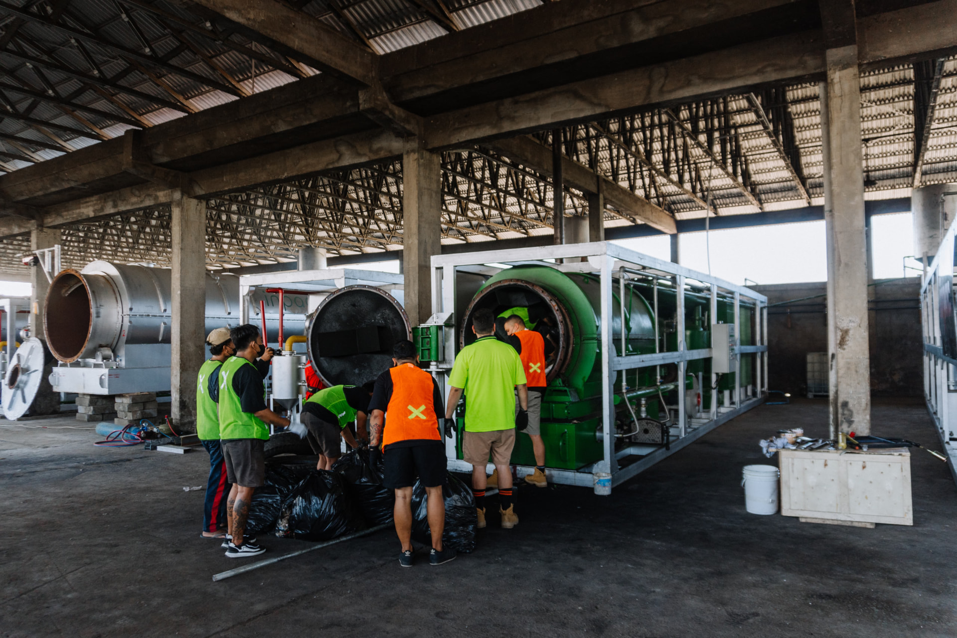 INPAC team working on the pyrolysis unit at the TOSS Centre in Klungkung